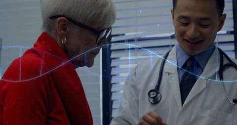 Doctor Consulting Senior Patient with DNA Strand Overlay