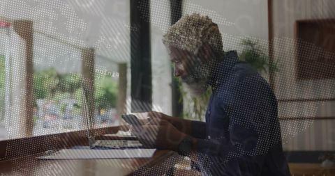 Business Professional Using Smartphone in Modern Workspace