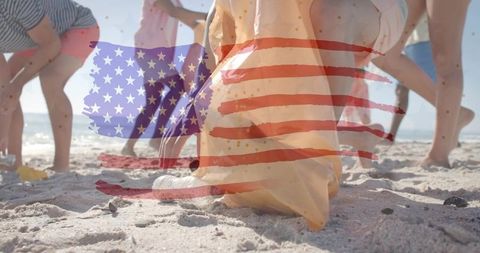 Volunteers cleaning beach with american flag overlay for coastal cleanup campaign