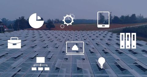 Aerial greenhouse roof grid creating geometric pattern with digital icons for agritech