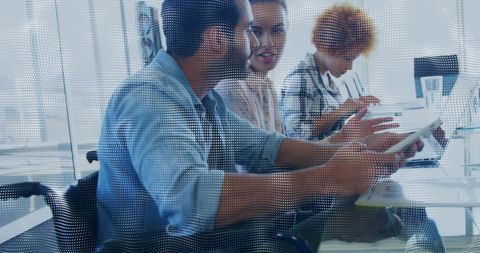 Colleagues collaborating with digital connections overlay