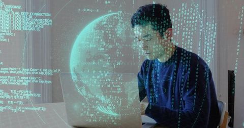 Coding Asian man typing on laptop using holographic globe visualization, futuristic workspace