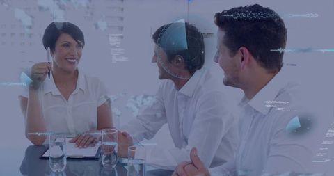 Smiling woman leading team meeting at glass table with digital data overlay and colleagues