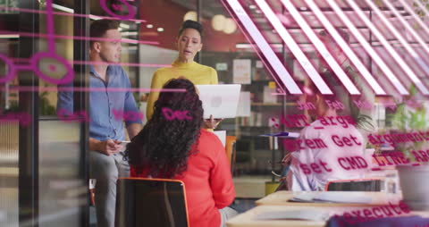 Diverse Team in High-Tech Office Discussing Reports with Coding Overlay