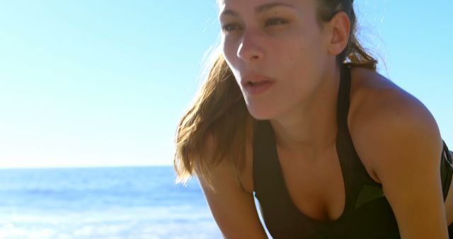 Woman Exercising Outdoors Near Ocean Beach Leading Active Lifestyle - Download Free Stock Images Pikwizard.com