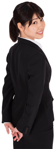 Smiling asian businesswoman glancing over shoulder transparent background