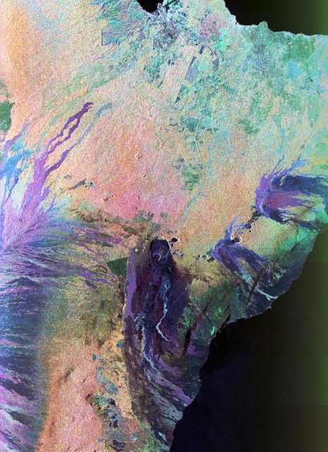 Color composite image highlighting volcano landscape on Big Island of Hawaii captured by NASA's Spaceborne Imaging Radar aboard space shuttle Endeavour. Useful for educational materials, geology and environmental science studies, and space exploration enthusiasts.