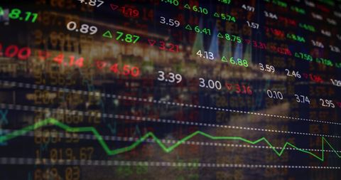Dynamic visualization of stock market data against cityscape