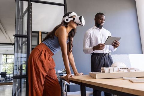 Architectural design meeting with vr and tablet technology