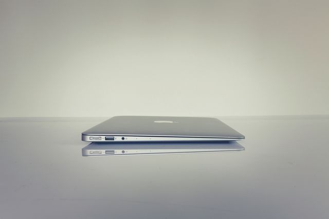 Silver Electronic Device on a Surface - Download Free Stock Photos Pikwizard.com