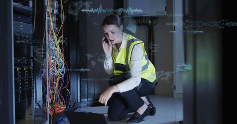 Female Engineer Analyzing Data in a Server Room - Download Free Stock Images Pikwizard.com
