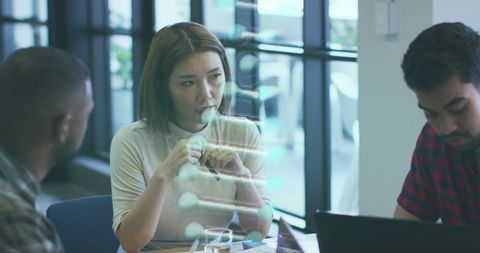 Diverse Team Discussing with Digital DNA Overlay