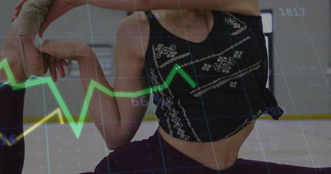 Teen dancer stretch with financial graph overlay