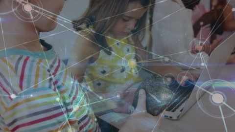 Young Students Exploring Digital Learning with High-Tech Interface