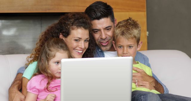 Happy Family Watching Movie on Laptop Together at Home - Download Free Stock Images Pikwizard.com