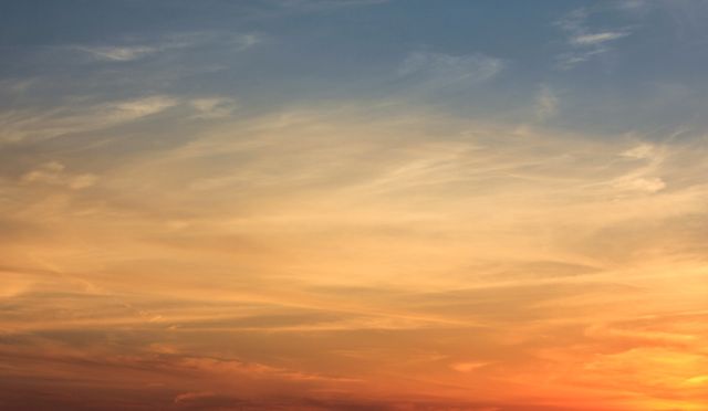 Colorful Sunset Sky with Warm Hues and Soft Clouds - Download Free Stock Photos Pikwizard.com