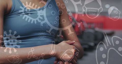 Icon overlay woman sanitizing hands gym covid-19 concept