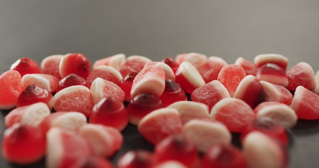 Assorted Red and Pink Gummies on Gray Surface - Download Free Stock Images Pikwizard.com