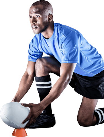 Athlete preparing rugby ball on kicking tee transparent background