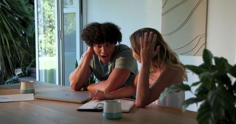 Young couple enjoying relaxed moment at home