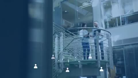 Business Professionals Discussing Work on Innovative Digital Staircase