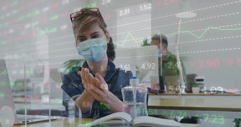 Business Professionals Analyzing Market Data with Safety Precautions