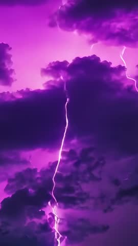 Vertical storm video showing layered clouds charging and releasing jagged purple lightning