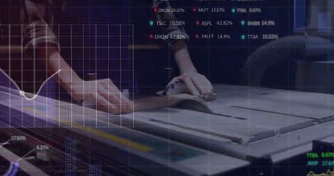 Carpenter skillfully cutting wood with circular saw in busy workshop