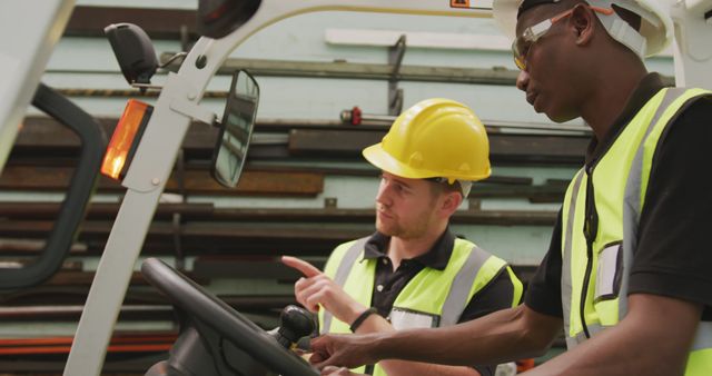 Diverse Male Workers Collaborating in Hydraulic Factory - Download Free Stock Images Pikwizard.com