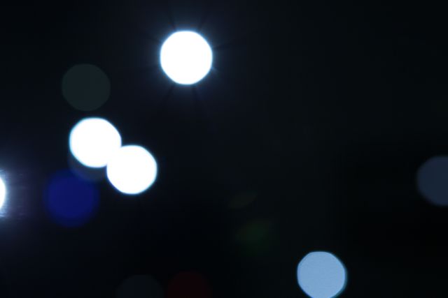 Abstract Blurred Lights On Dark Background - Download Free Stock Photos Pikwizard.com