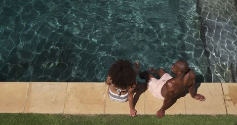 Enjoying a Sunny Day by the Pool - Download Free Stock Images Pikwizard.com