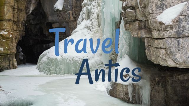 Travel antics text in blue over snow on rocks - Download Free Stock Videos Pikwizard.com