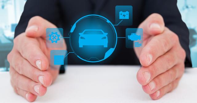 Businessman holding hands around a holographic virtual car surrounded by futuristic icons related to car mechanics and data. Suitable for articles on automobile technology, innovation in car manufacturing, and data security in the automotive industry.