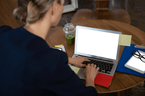 Rear View of Businesswoman Typing on Transparent Screen Laptop - Download Free Stock Videos Pikwizard.com