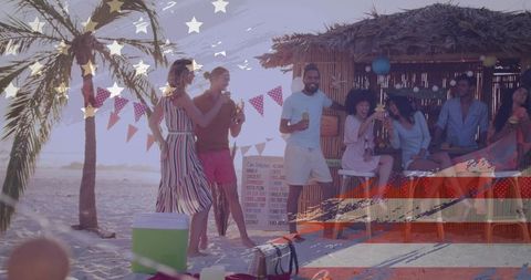 Sunset beach tiki bar party with friends laughing, drinking, and celebrating outdoors