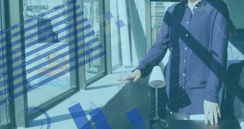 Caucasian Businesswoman with Financial Graphs Innovation Concept