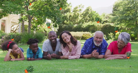 Multigenerational Family Relaxing on Sunny Garden Lawn