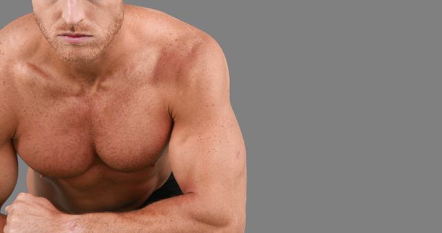A muscular Caucasian man is focused and showcasing his fit physique, with copy space - Download Free Stock Photos Pikwizard.com