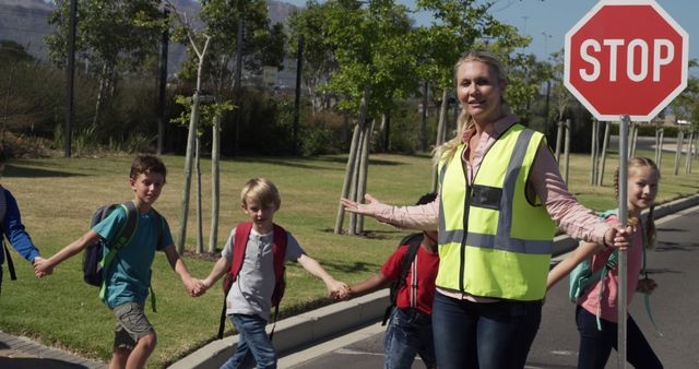 Crossing Guard Helping Children Cross Street Safely - Download Free Stock Images Pikwizard.com