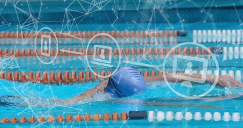 Freestyle swimmer training in pool with digital network overlay for performance analytics