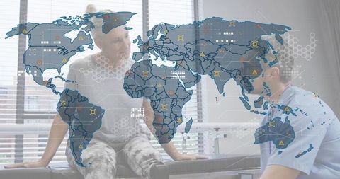 Senior woman consulting clinician with global health data overlay in modern clinic