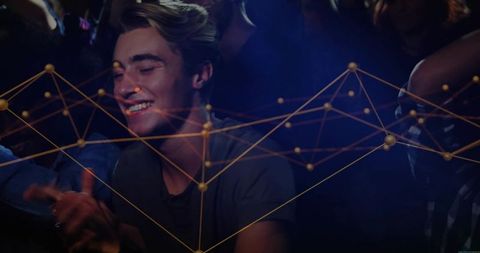 Smiling Man in Nightclub with Digital Network Overlay