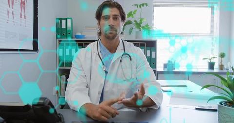 Doctor using smart technology for patient consultation in modern clinic