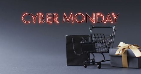 Cyber monday shopping cart with gifts and neon text