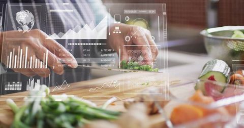 Senior Indian Hands Chopping Herbs on Wooden Board with Augmented Reality HUD