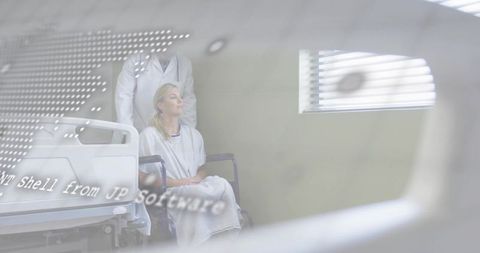 Female patient sitting in wheelchair with doctor behind, clinic bed and data overlay