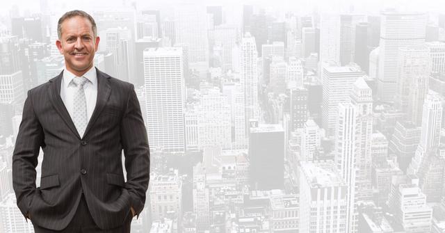Smiling businessman standing confidently with hands in pockets against modern urban cityscape. Ideal for illustrating concepts of success, leadership, professional attire, urban lifestyle, and business environment.