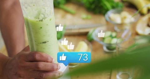 Chef Preparing Healthy Green Smoothie with Social Media Insights