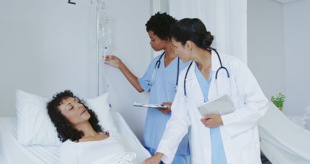 Doctors and Nurse Attending to Hospitalized Patient - Download Free Stock Images Pikwizard.com