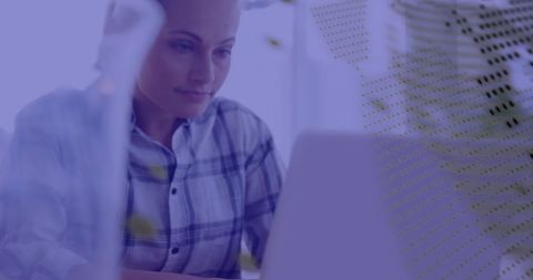 Focused Businesswoman Analyzing Financial Data on Laptop - Download Free Stock Images Pikwizard.com